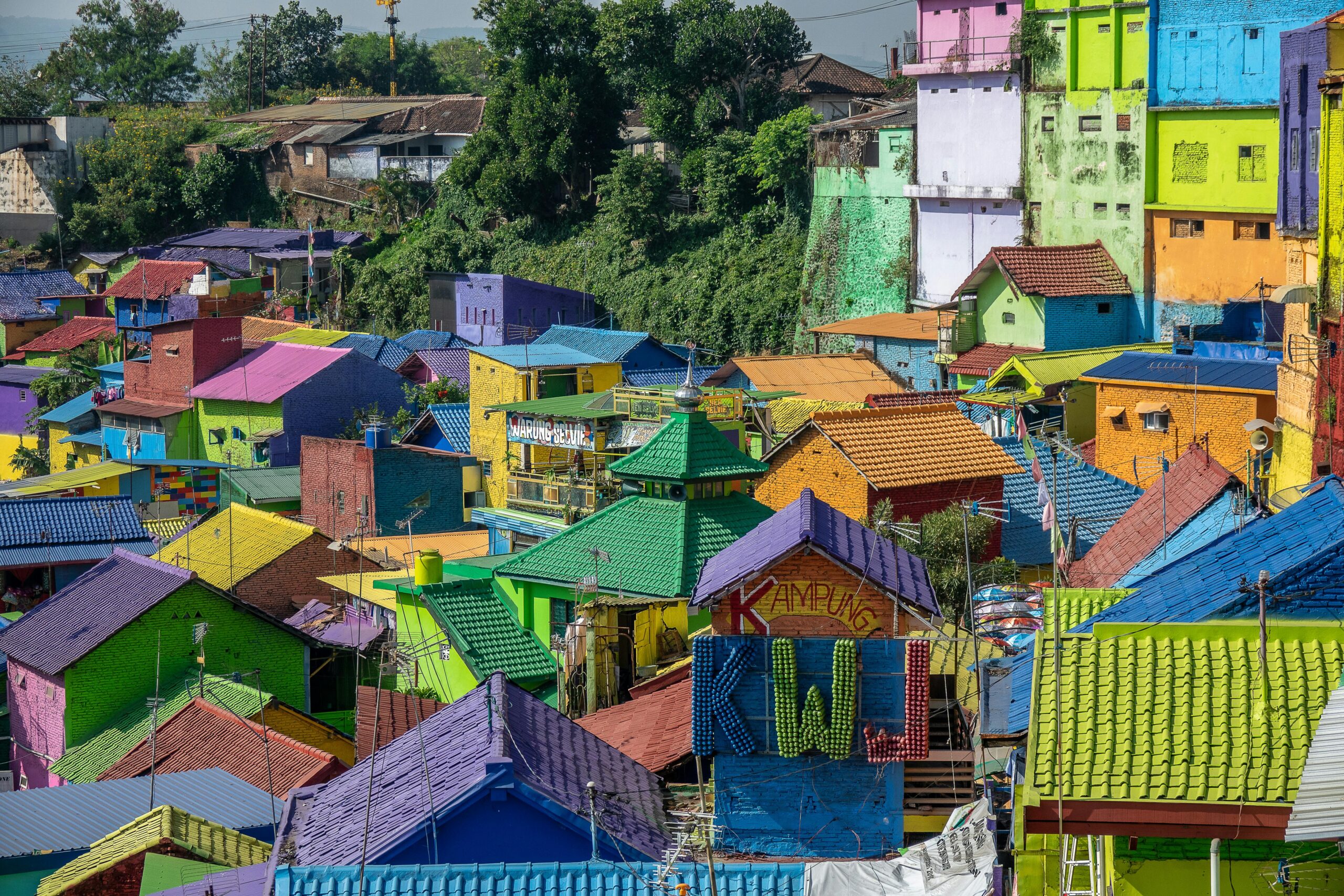 Explore the vivid and colorful houses of Kampung Warna-Warni, a lively residential area perfect for summer tourism.